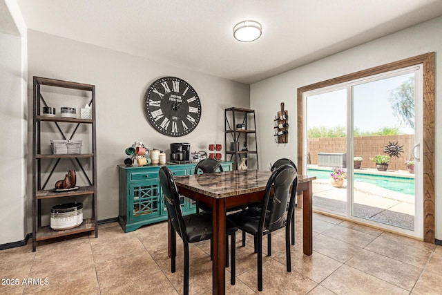 3032 W Red Fox Rd, Phoenix, AZ 85083 - dining area featuring baseboards and light tile patterned floors