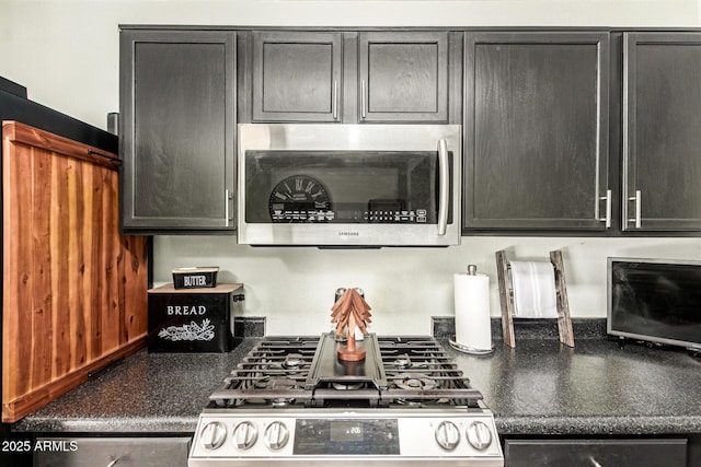 3032 W Red Fox Rd, Phoenix, AZ 85083 - kitchen featuring stainless steel appliances and dark countertops