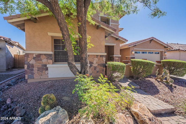 view of front of home with a garage