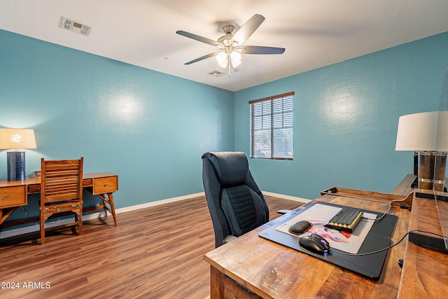 office area with wood-type flooring and ceiling fan