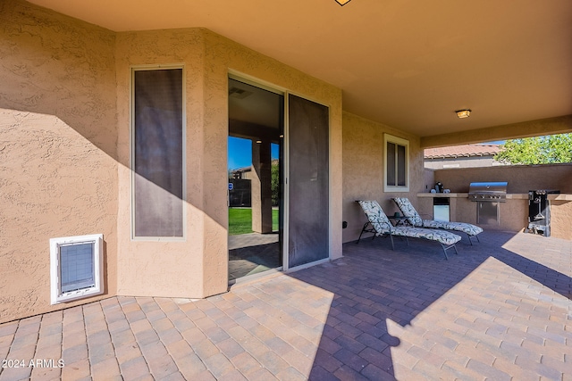 view of patio with area for grilling