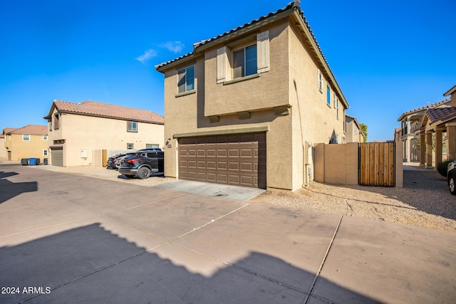 exterior space with a garage