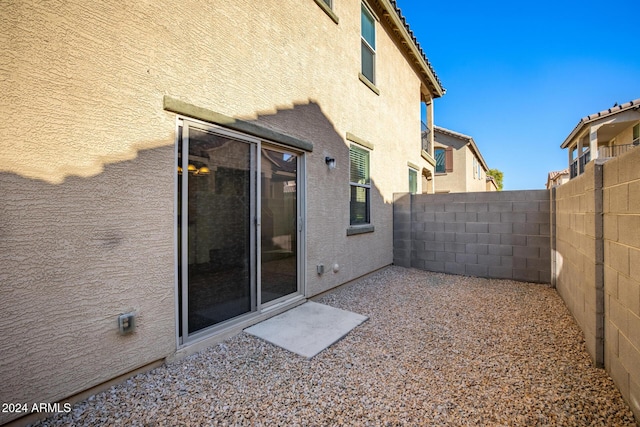 rear view of property with a patio area