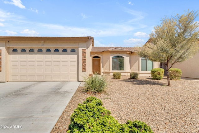 view of front of home with a garage