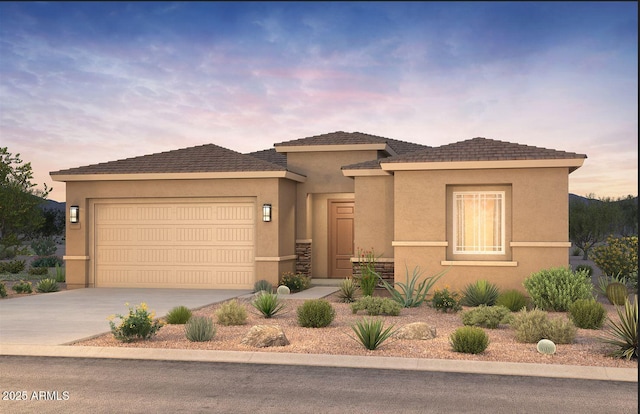 prairie-style home with a garage