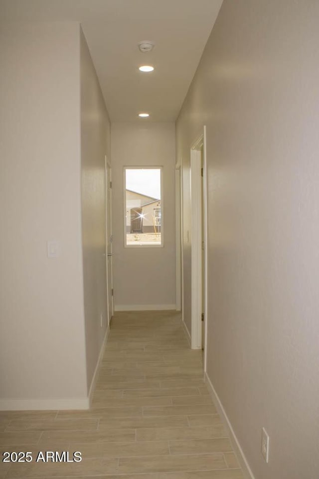 hallway featuring light hardwood / wood-style flooring