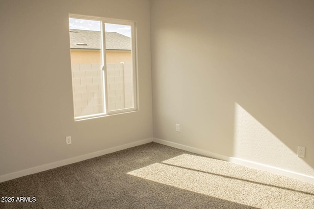 view of carpeted spare room