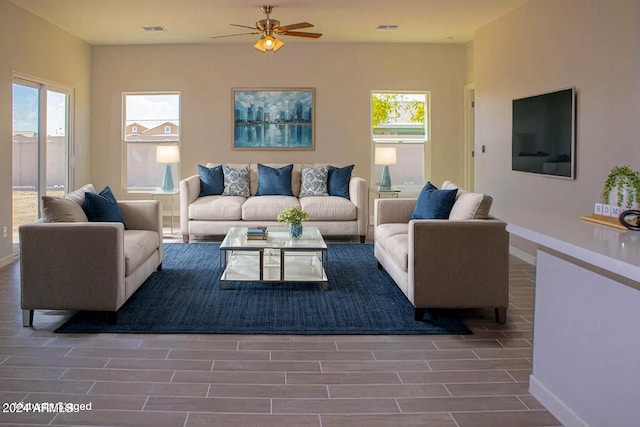 living room featuring ceiling fan