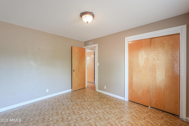 5228 E Des Moines St, Mesa, AZ 85205 - unfurnished bedroom with baseboards and a closet