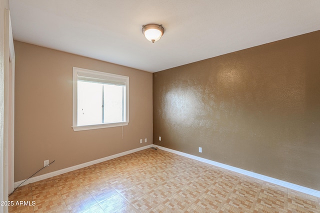 5228 E Des Moines St, Mesa, AZ 85205 - empty room featuring light flooring and baseboards