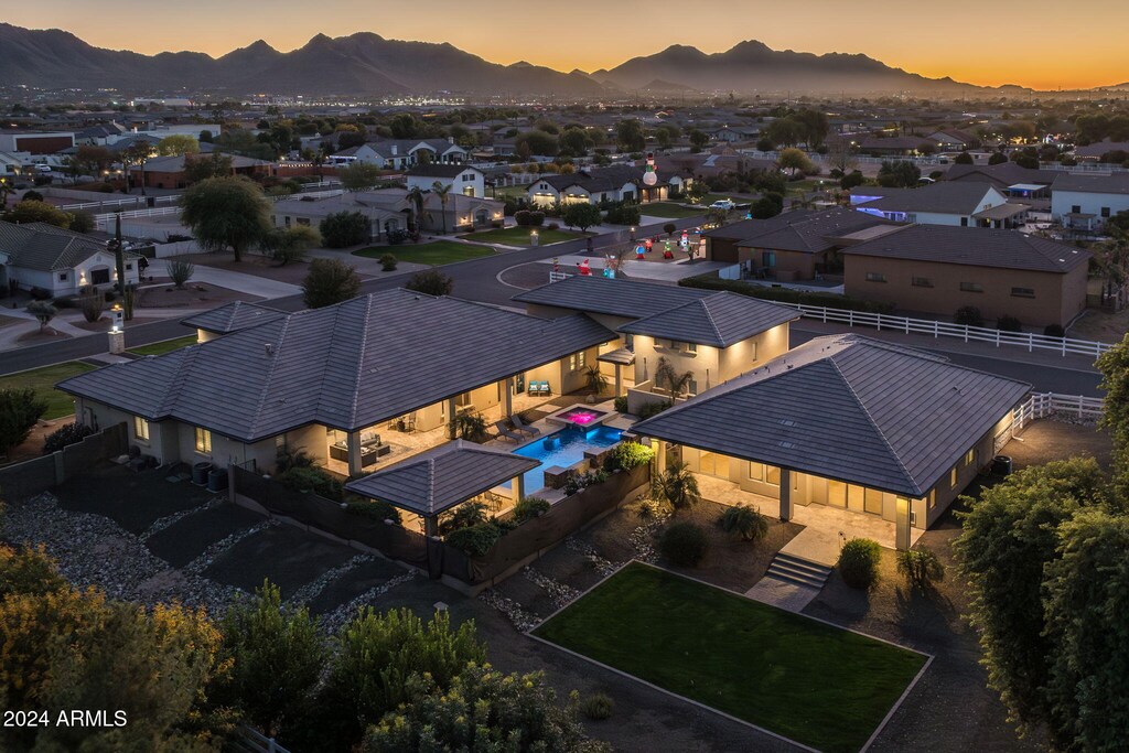 aerial view at dusk with a mountain view