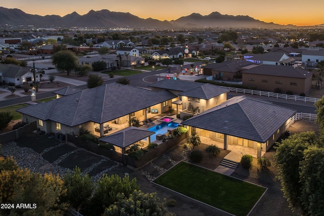 aerial view at dusk with a mountain view