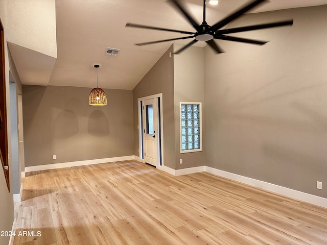 unfurnished room featuring high vaulted ceiling, ceiling fan, and light hardwood / wood-style flooring