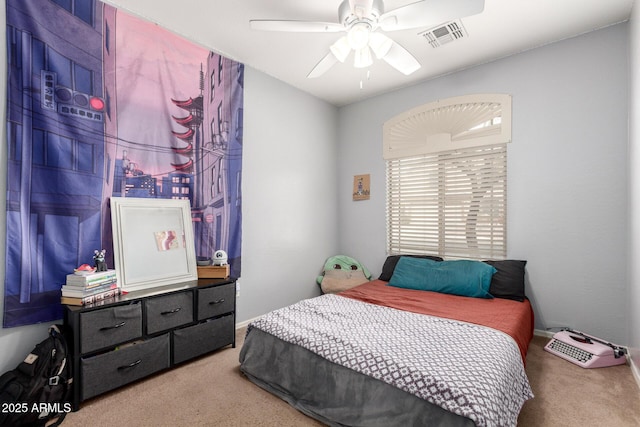 bedroom with visible vents, carpet floors, and ceiling fan