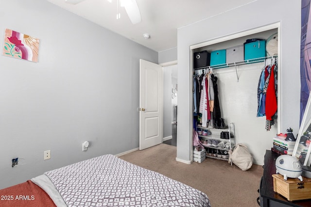 bedroom featuring a closet, baseboards, carpet, and a ceiling fan