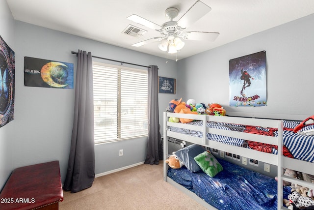 bedroom with baseboards, carpet, visible vents, and ceiling fan