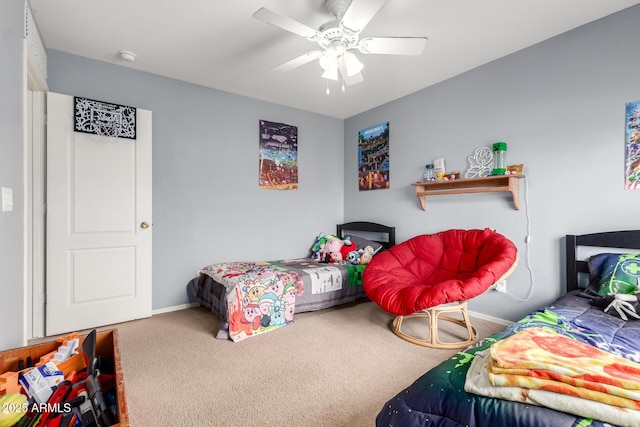 bedroom featuring baseboards, a ceiling fan, and carpet flooring