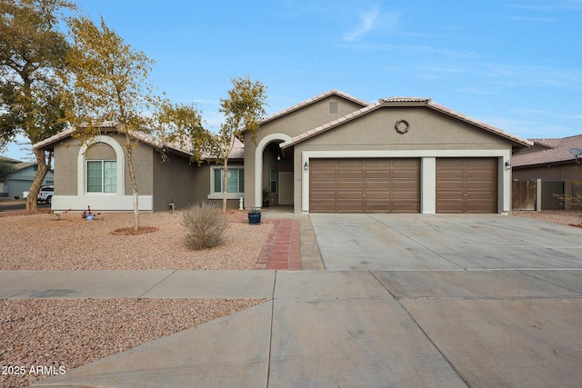 ranch-style home featuring a garage