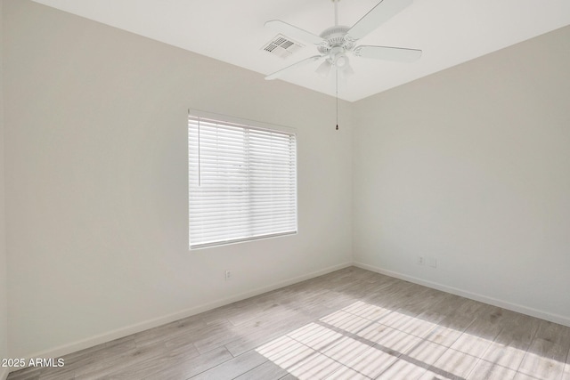 unfurnished room featuring ceiling fan and light hardwood / wood-style flooring