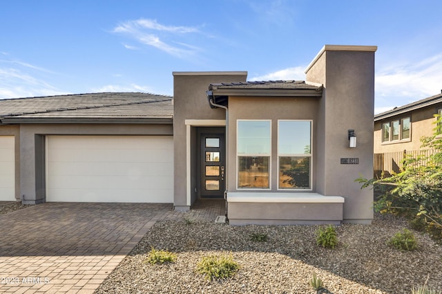 view of front of home with a garage