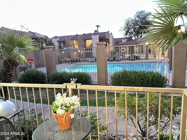 view of swimming pool featuring area for grilling