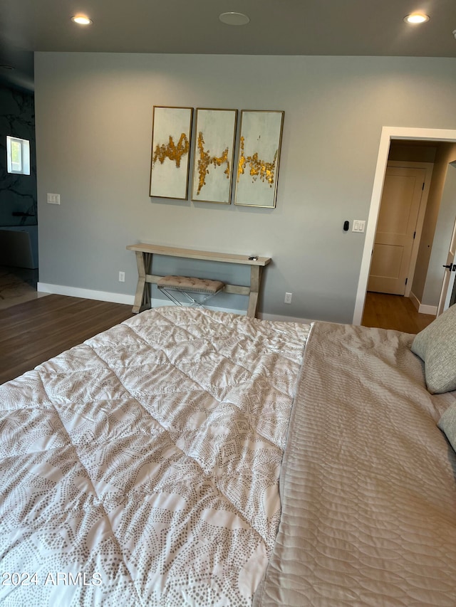 bedroom featuring wood-type flooring