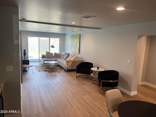 living room with light hardwood / wood-style floors