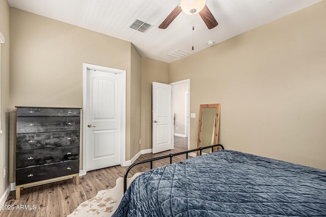 1367 S Country Club Dr Unit 1331, Mesa, AZ 85210 - bedroom featuring wood finished floors, lofted ceiling, and a ceiling fan
