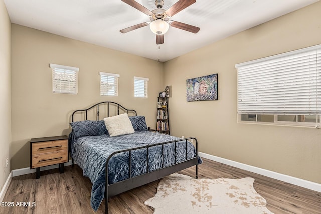 1367 S Country Club Dr Unit 1331, Mesa, AZ 85210 - bedroom featuring wood finished floors and a ceiling fan