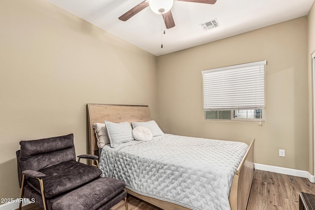 1367 S Country Club Dr Unit 1331, Mesa, AZ 85210 - bedroom with wood finished floors and a ceiling fan
