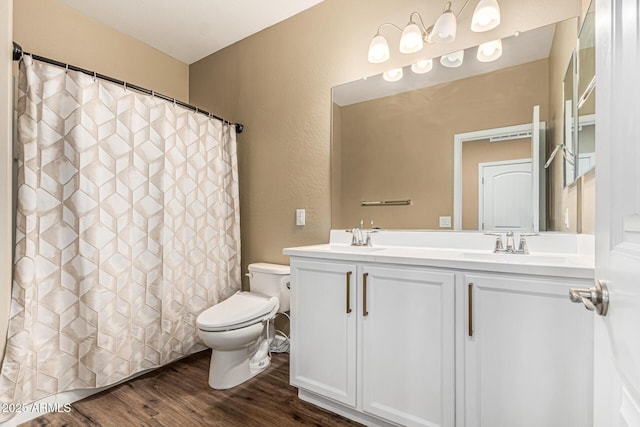 1367 S Country Club Dr Unit 1331, Mesa, AZ 85210 - full bathroom featuring wood finished floors, double vanity, a textured wall, and a shower with curtain