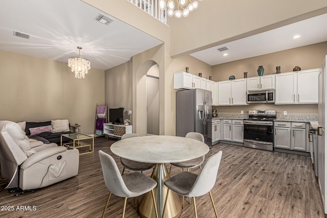 1367 S Country Club Dr Unit 1331, Mesa, AZ 85210 - dining room featuring a chandelier, dark wood-style floors, and recessed lighting