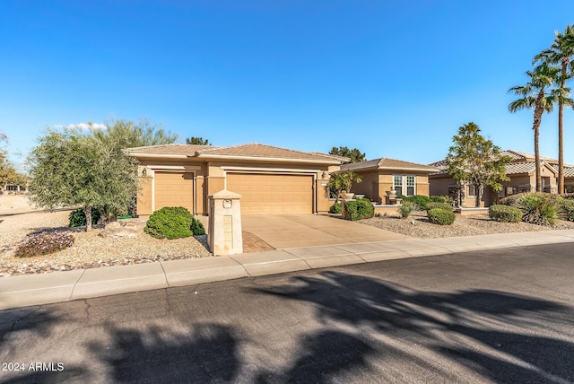 view of front of home with a garage