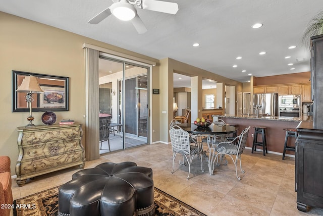 dining area with ceiling fan