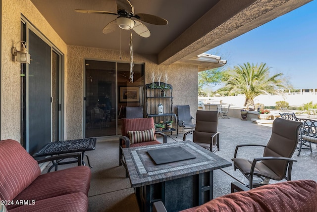 view of patio / terrace featuring ceiling fan