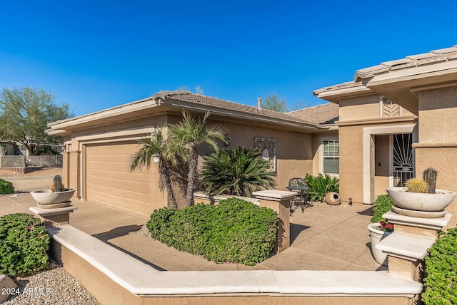 exterior space with a garage