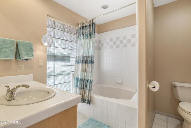 bathroom with a wealth of natural light, toilet, shower / tub combo with curtain, and tile patterned floors