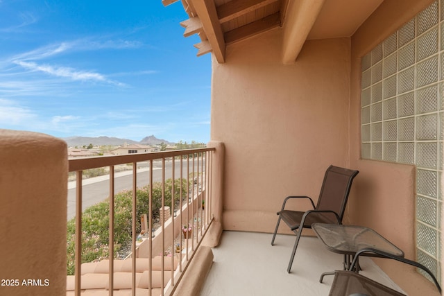 balcony featuring a mountain view