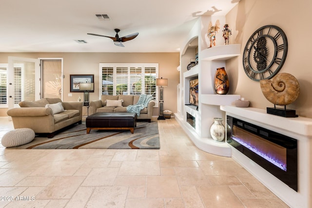 living room with ceiling fan