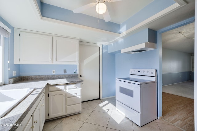 kitchen with white cabinetry, sink, ceiling fan, white electric stove, and light tile patterned floors