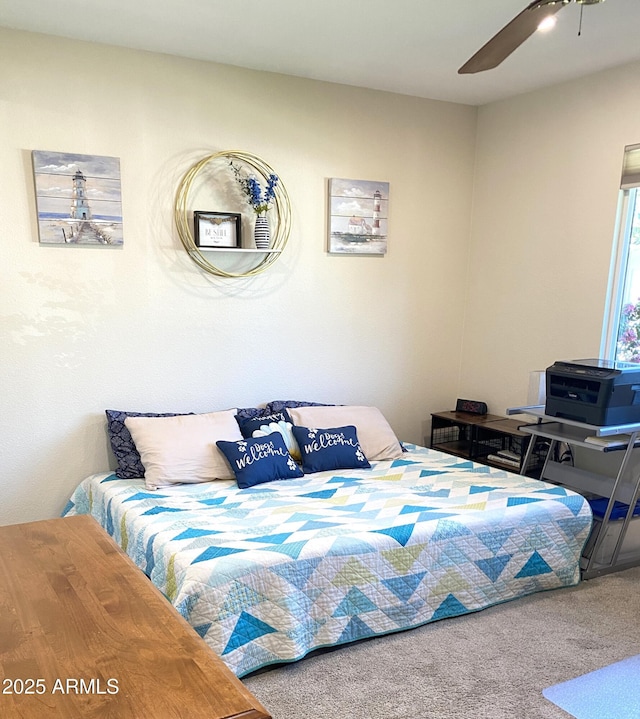 bedroom with carpet flooring and ceiling fan