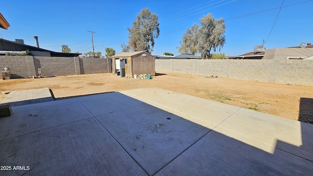 view of patio / terrace with a storage shed