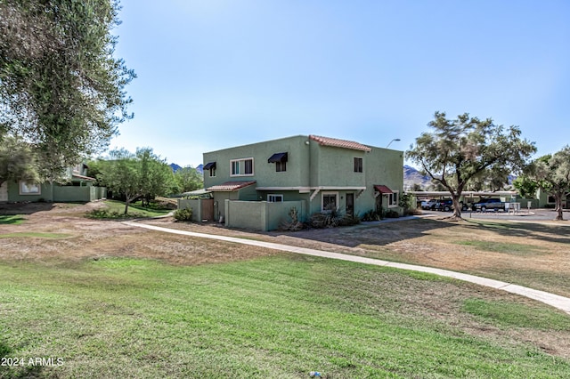 view of front of house with a front lawn