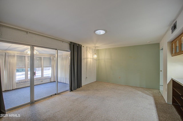 empty room featuring carpet floors