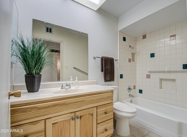 bathroom with tile patterned floors, visible vents, toilet, shower / bath combination, and vanity