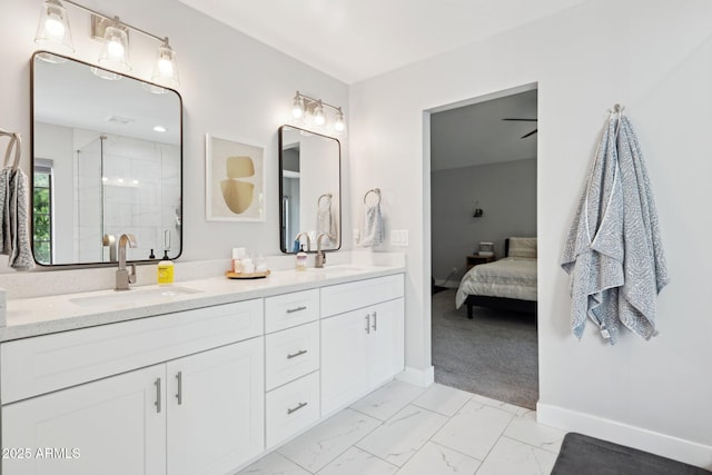 2604 N 27th St Unit 1, Phoenix, AZ 85008 - ensuite bathroom with double vanity, a stall shower, and marble look tiles