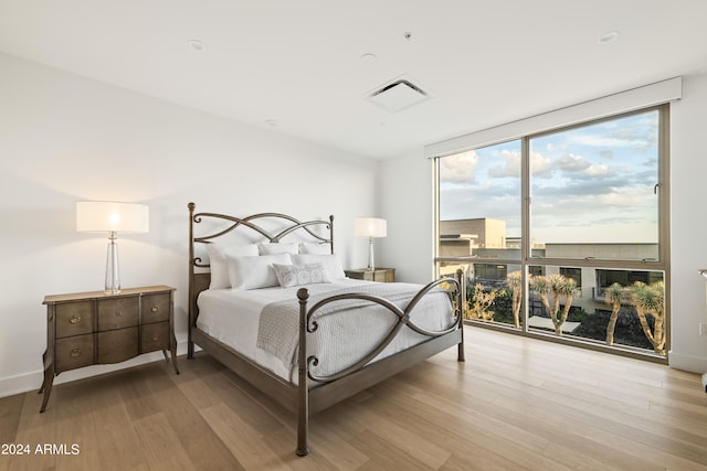 bedroom featuring light wood-type flooring