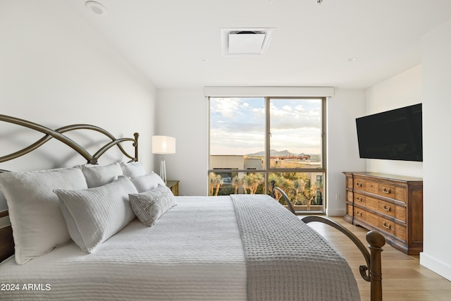 bedroom featuring light hardwood / wood-style floors