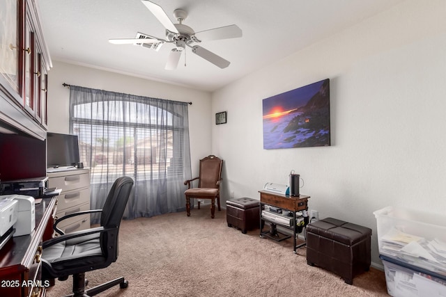 office area featuring ceiling fan and light carpet