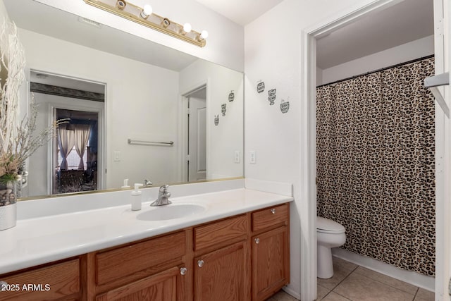 bathroom featuring toilet, visible vents, curtained shower, tile patterned flooring, and vanity